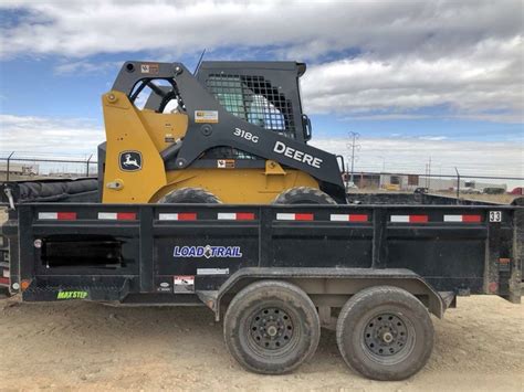 skid steer on 7000 lb trailer|skid steer dump trailers.